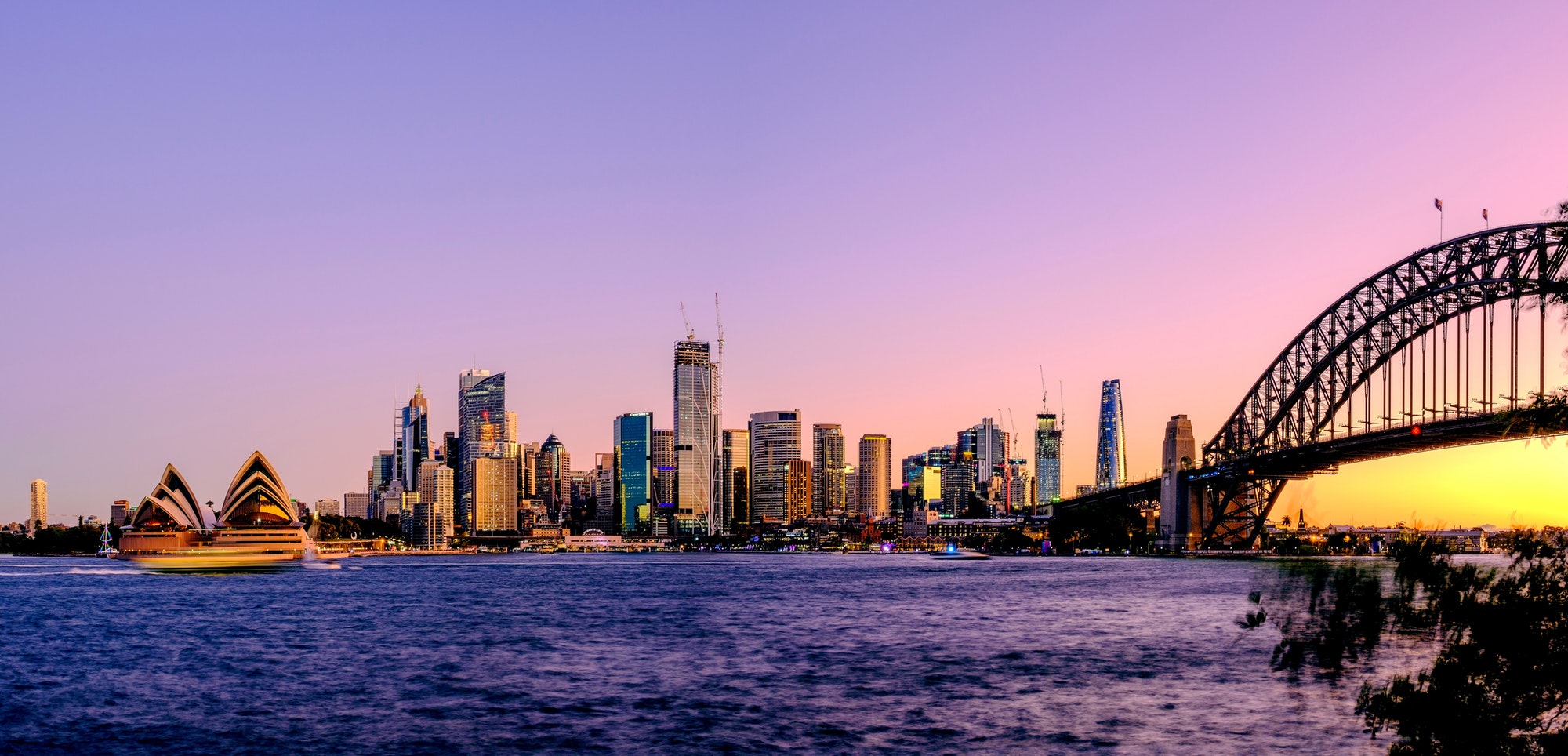 Panoramic view of the cityscape of the Sydney, Australia at sunset